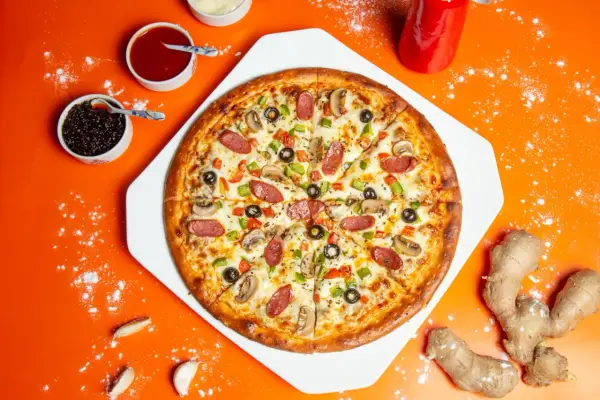 Dodatki do pizzy - Jak łączyć składniki i zachować chrupki spód?